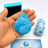 a large larimar stone teardrop pendant