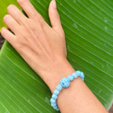 Larimar Bead Bracelet – 7–8mm Beads with 13mm Center Bead, Genuine Dominican Blue Stone
