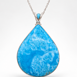 a high grade larimar pendant in teardrop shape