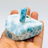 a high grade larimar 925 sterling silver ring on a polsihed larimar stone