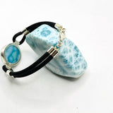 a black cord larimar bracelet