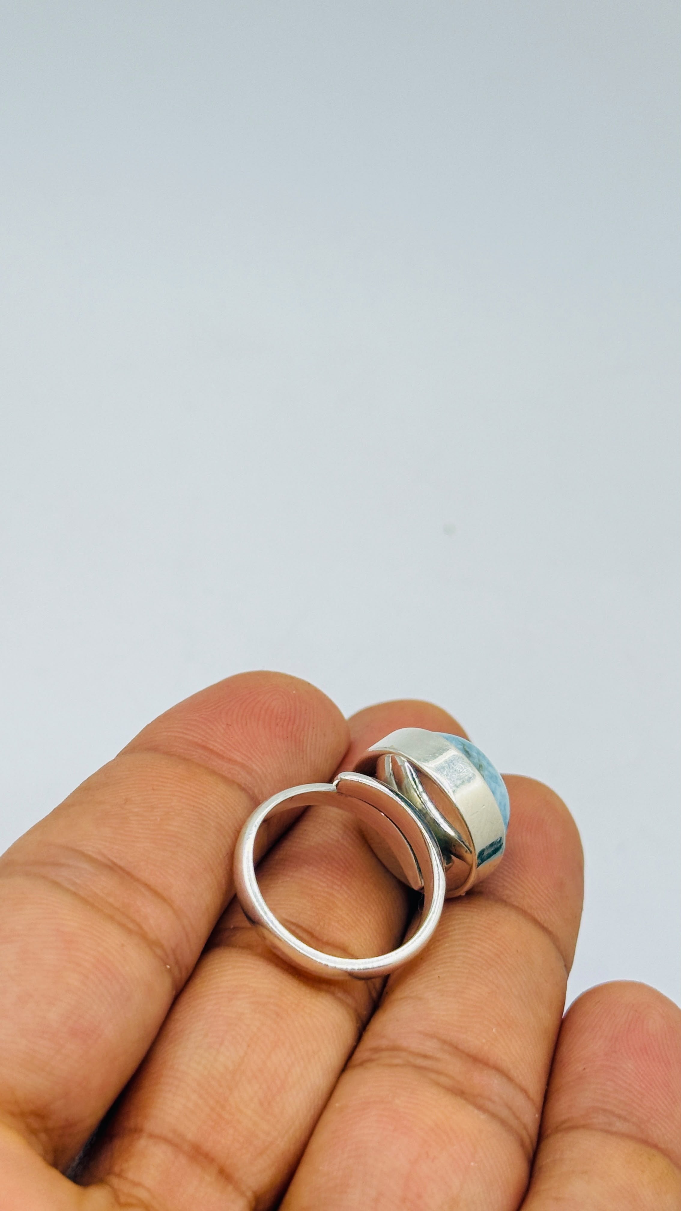 the backside of a larimar adjustable ring