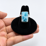 A silver larimar  ring with a rectangular 