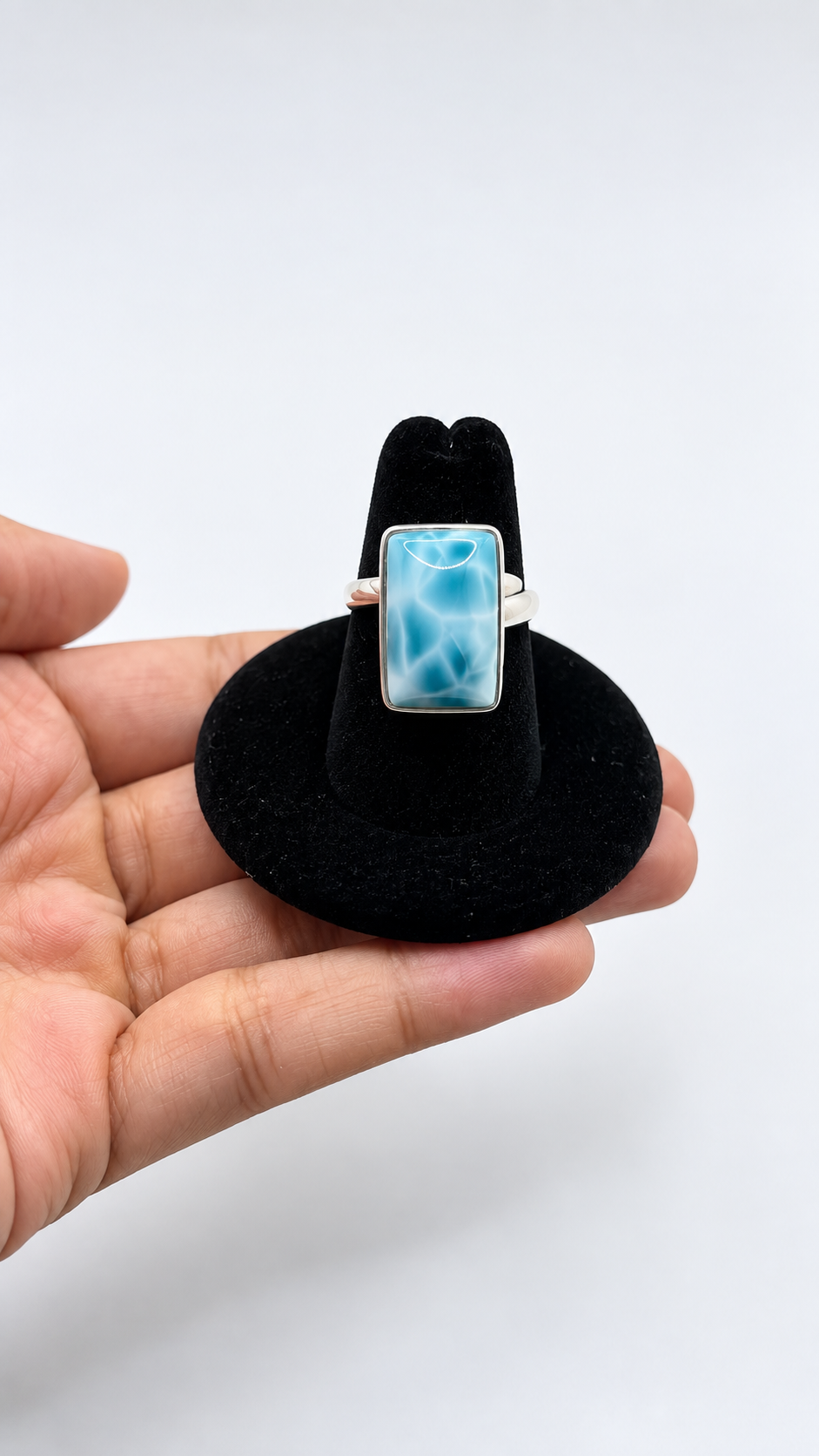 A silver larimar  ring with a rectangular 