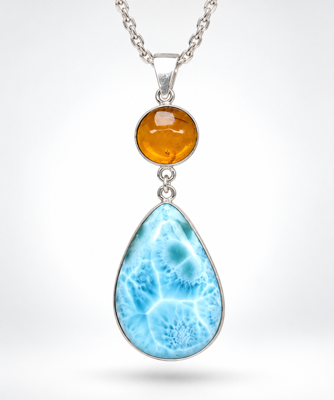 Dominican Larimar teardrop pendant in 925 sterling silver, front view, for everyday wear, Mauna Vibes