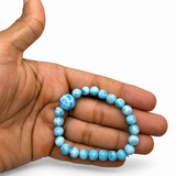Larimar Bead Bracelet – 7–8mm Beads with 13mm Center Bead, Genuine Dominican Blue Stone