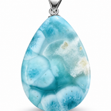 A teardrop-shaped pendant featuring a marbled turquoise and light blue stone with white veining and tiny gold flecks, suspended from a silver bail on a white background.