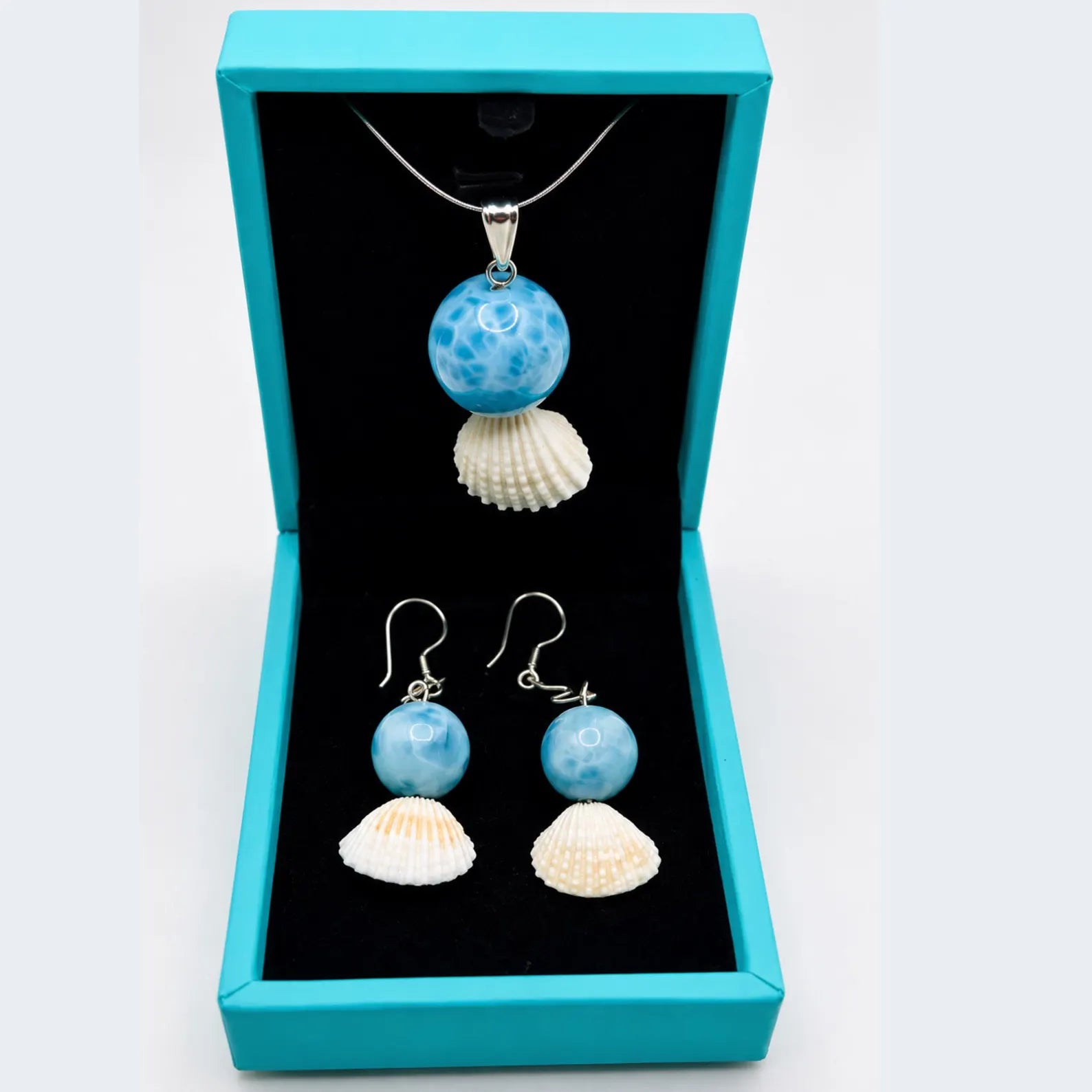 larimar  stone pendnat and earrings in a luxury mauna vibes box 