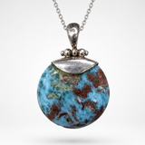 Round Larimar Pendant in 925 Sterling Silver, Red Dominican Stone Specimen