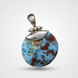Round Larimar Pendant in 925 Sterling Silver, Red Dominican Stone Specimen