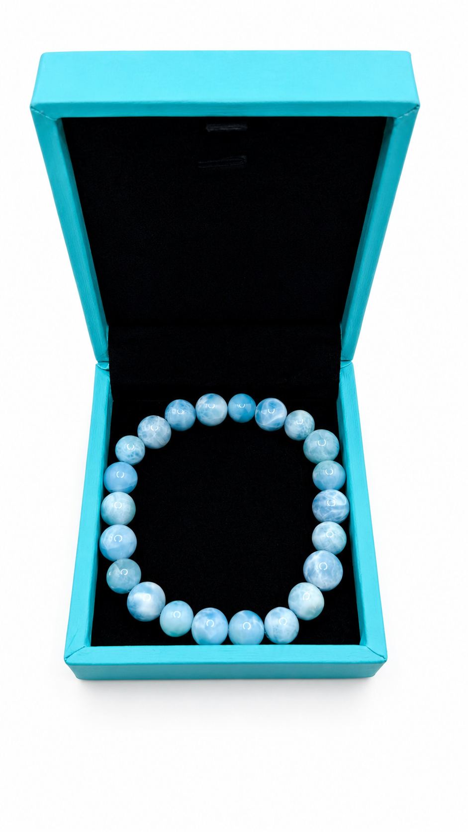 A Larimar
 beaded bracelet displayed inside an open turquoise jewelry box with a black interior, set against a plain white background.