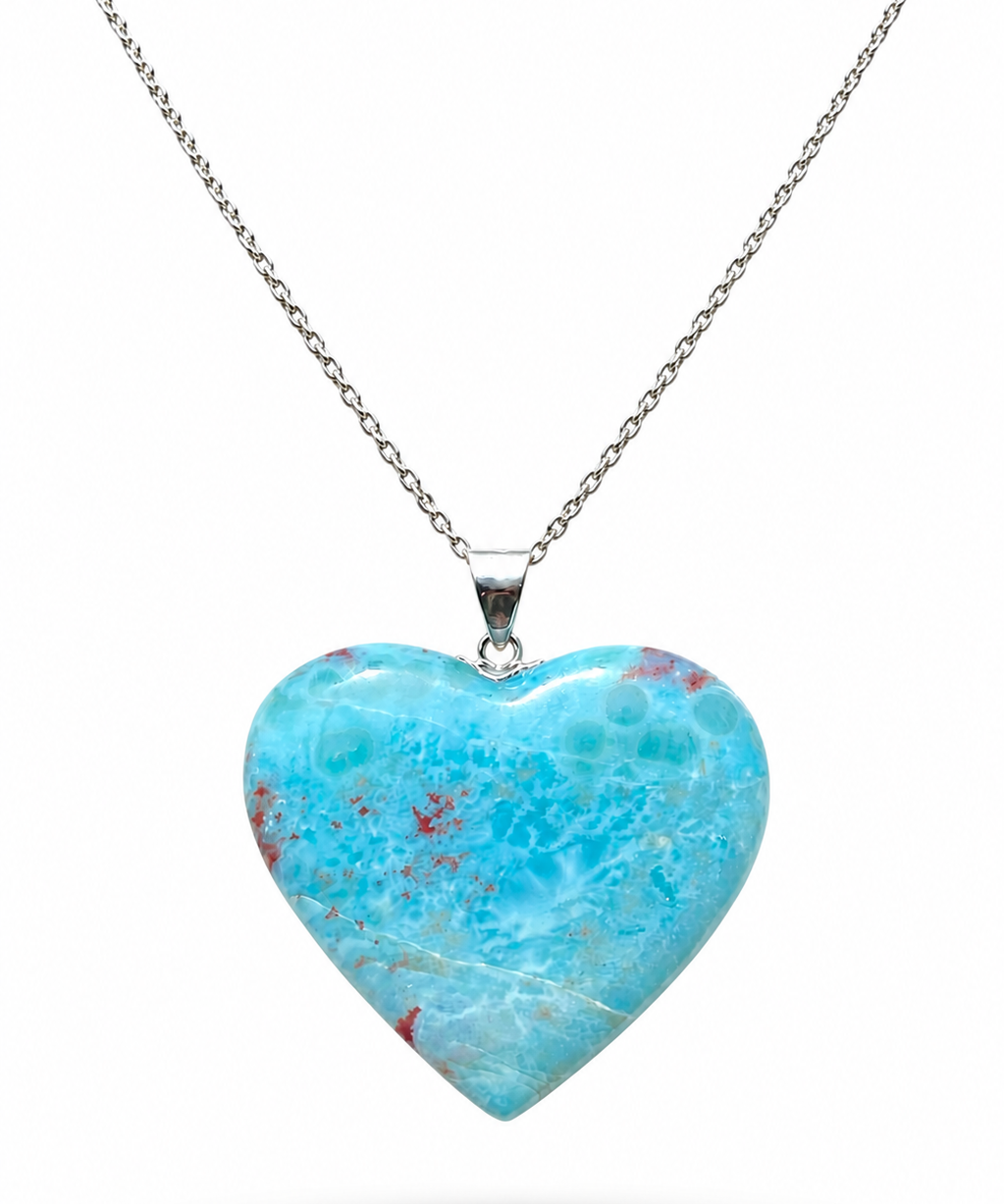 A heart-shaped Larimar pendant necklace with a silver chain, displayed against a clean white background.