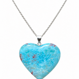 A heart-shaped Larimar pendant necklace with a silver chain, displayed against a clean white background.