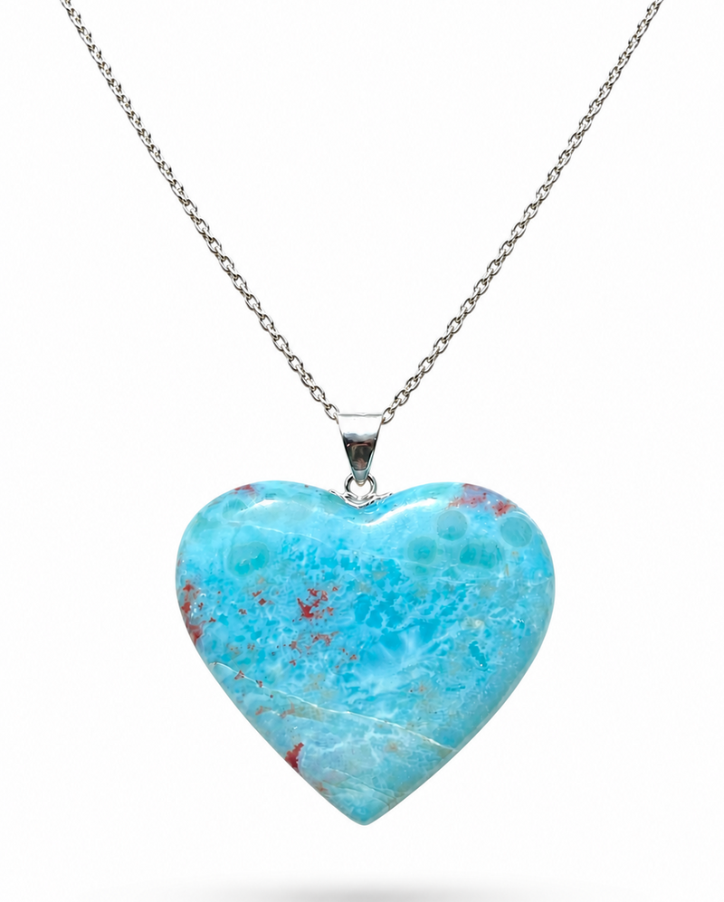 A heart-shaped Larimar pendant necklace with a silver chain, displayed against a clean white background.