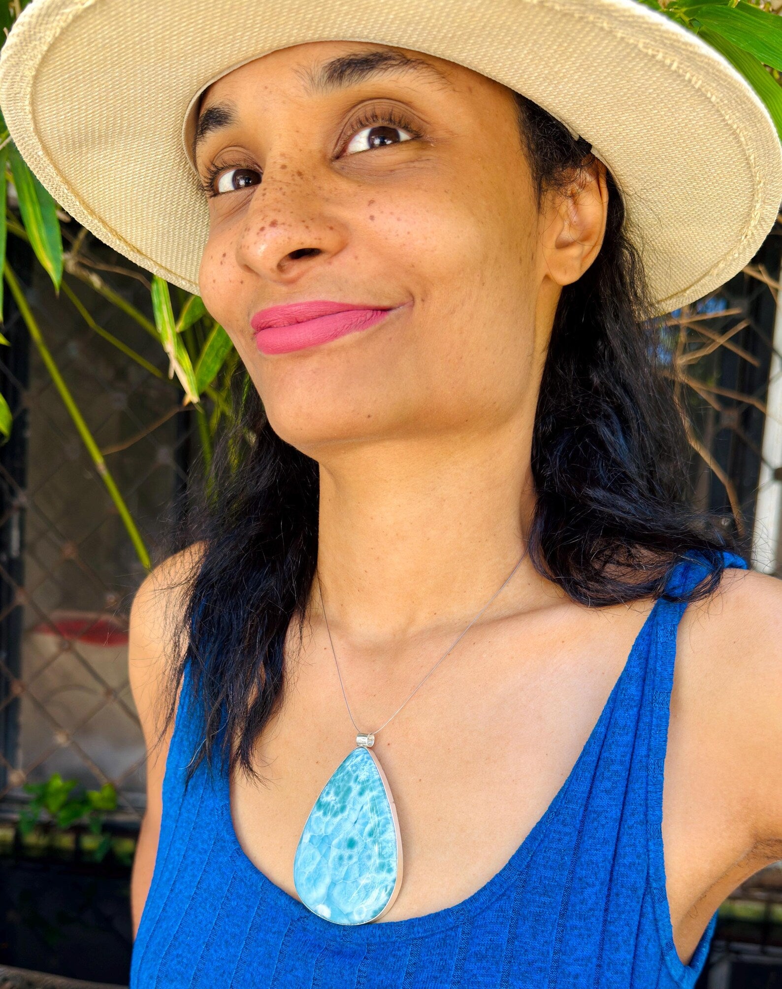 AAA grade Dominican Larimar teardrop pendant in 925 sterling silver, angled view, as a gift for her, Mauna Vibes