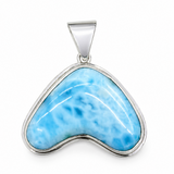 Blue larimar pendant with silver setting on a white background