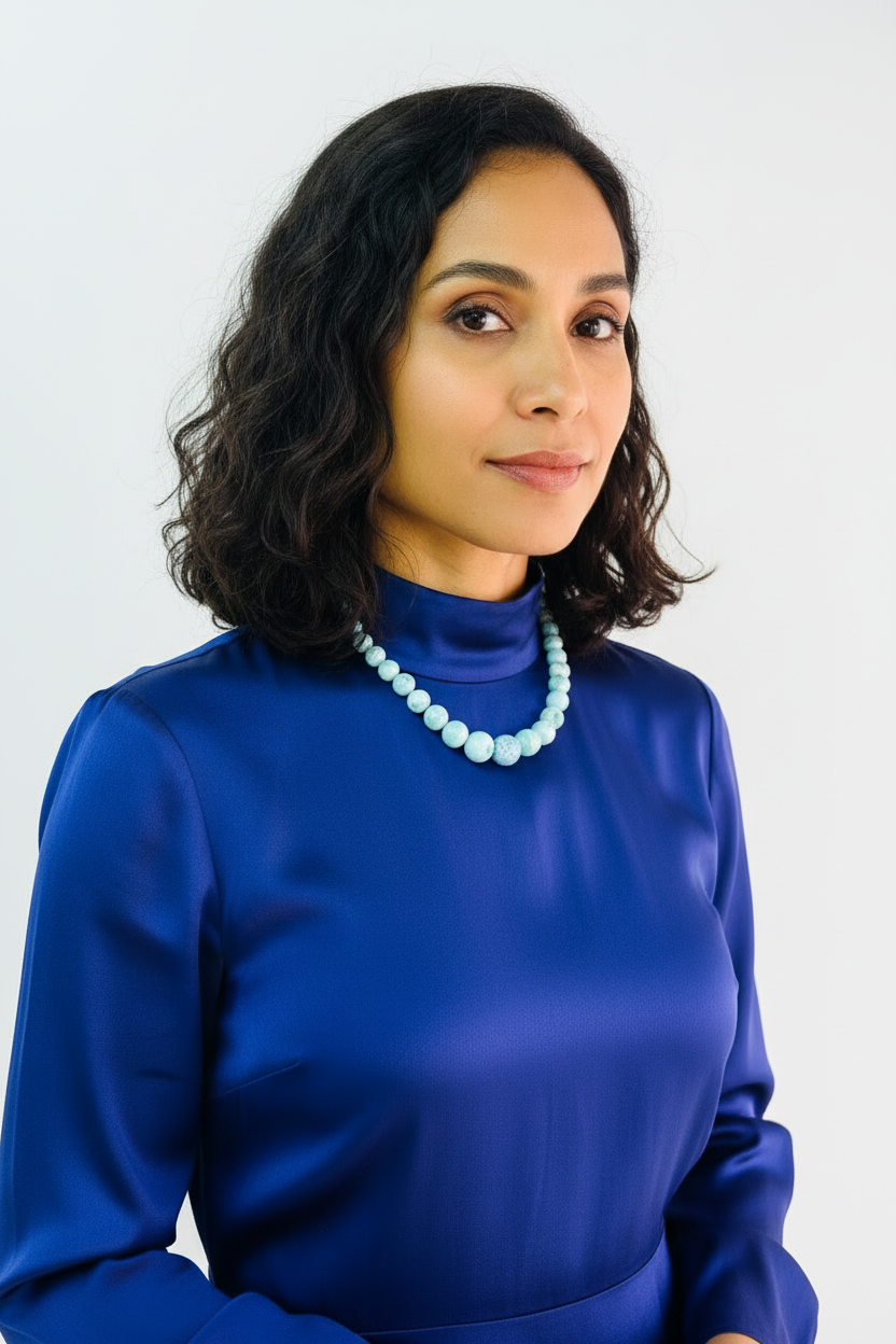 Woman wearing a blue larimar necklace