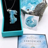Larimar rabbit pendant close-up – Caribbean blue gemstone with a larimar slab stone and packed in a box