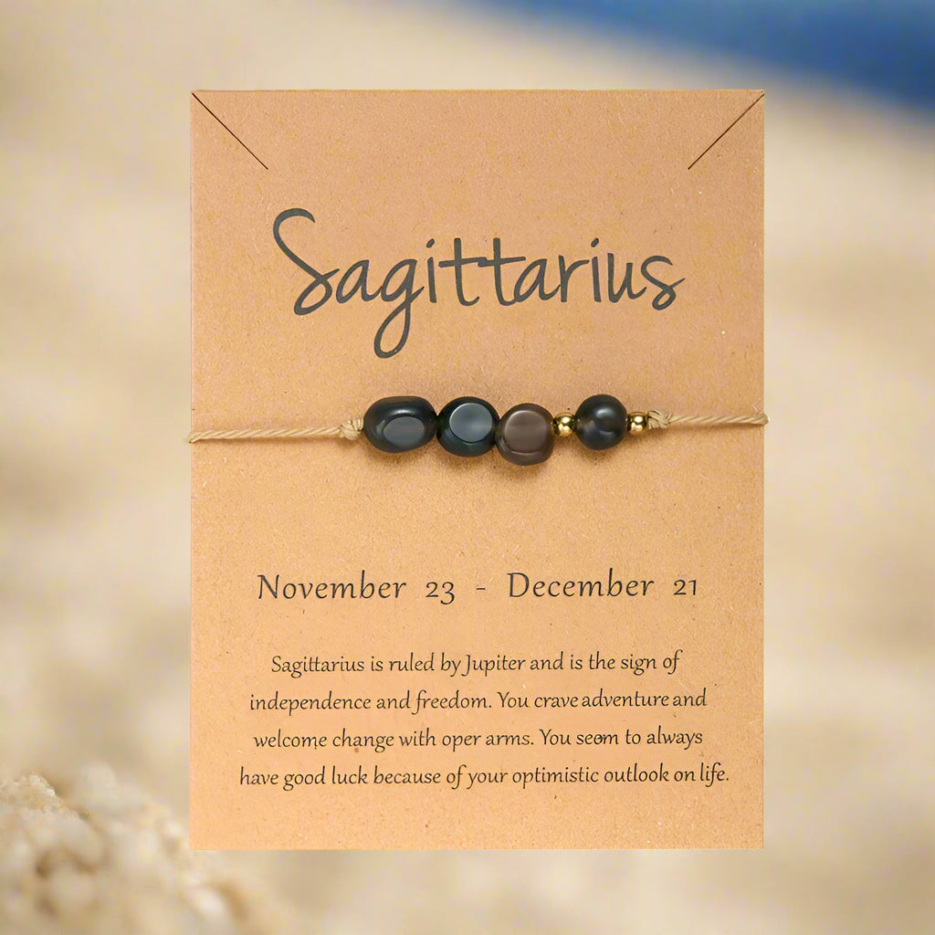 A collection of zodiac sign-themed bracelets on a beige background, each with a different set of colors and stones, and labeled with the corresponding zodiac sign names.