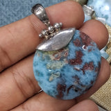 Round Larimar Pendant in 925 Sterling Silver, Red Dominican Stone Specimen