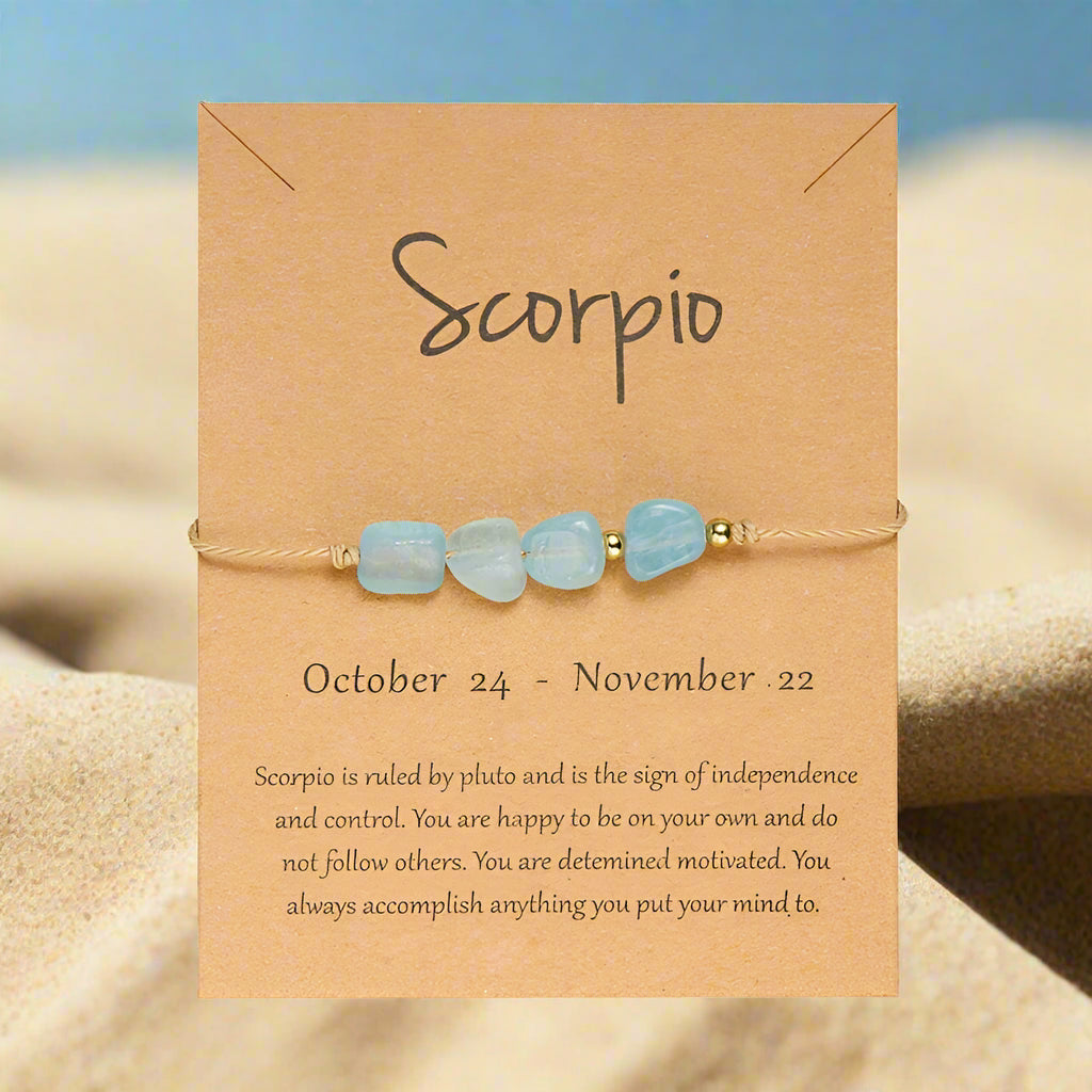 A collection of zodiac sign-themed bracelets on a beige background, each with a different set of colors and stones, and labeled with the corresponding zodiac sign names.