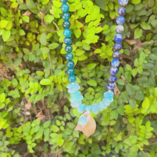 "Detail of genuine Larimar, Apatite, and Lapis Lazuli stones in Three Seas Necklace – calming blue crystals representing ocean energy."

