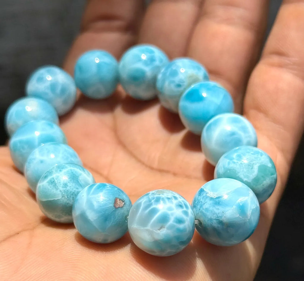 A Genuine Larimar Bead Bracelet in the beach in the Dominican Republic